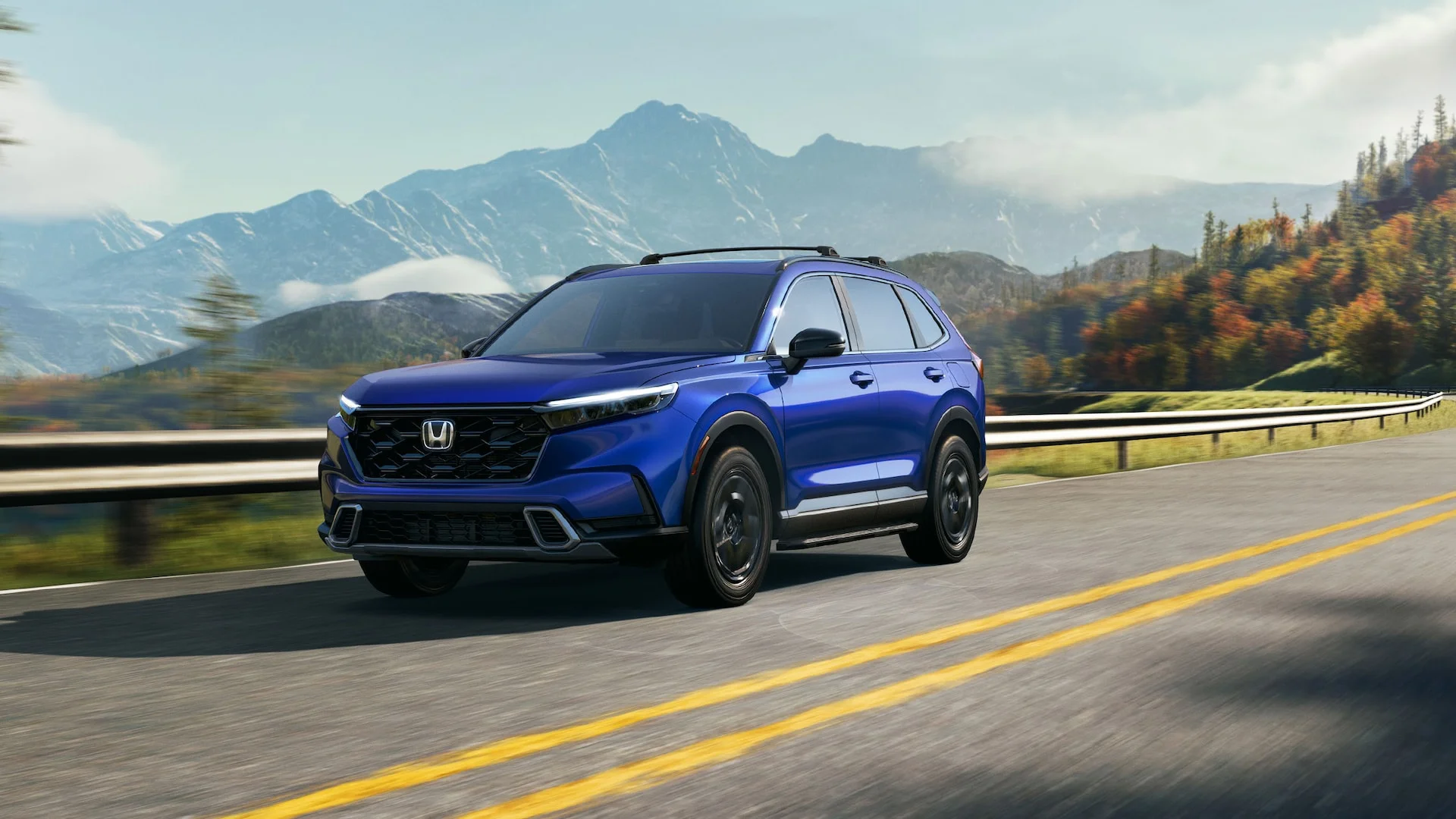 2026 Honda CR-V Driving down highway in the mountains