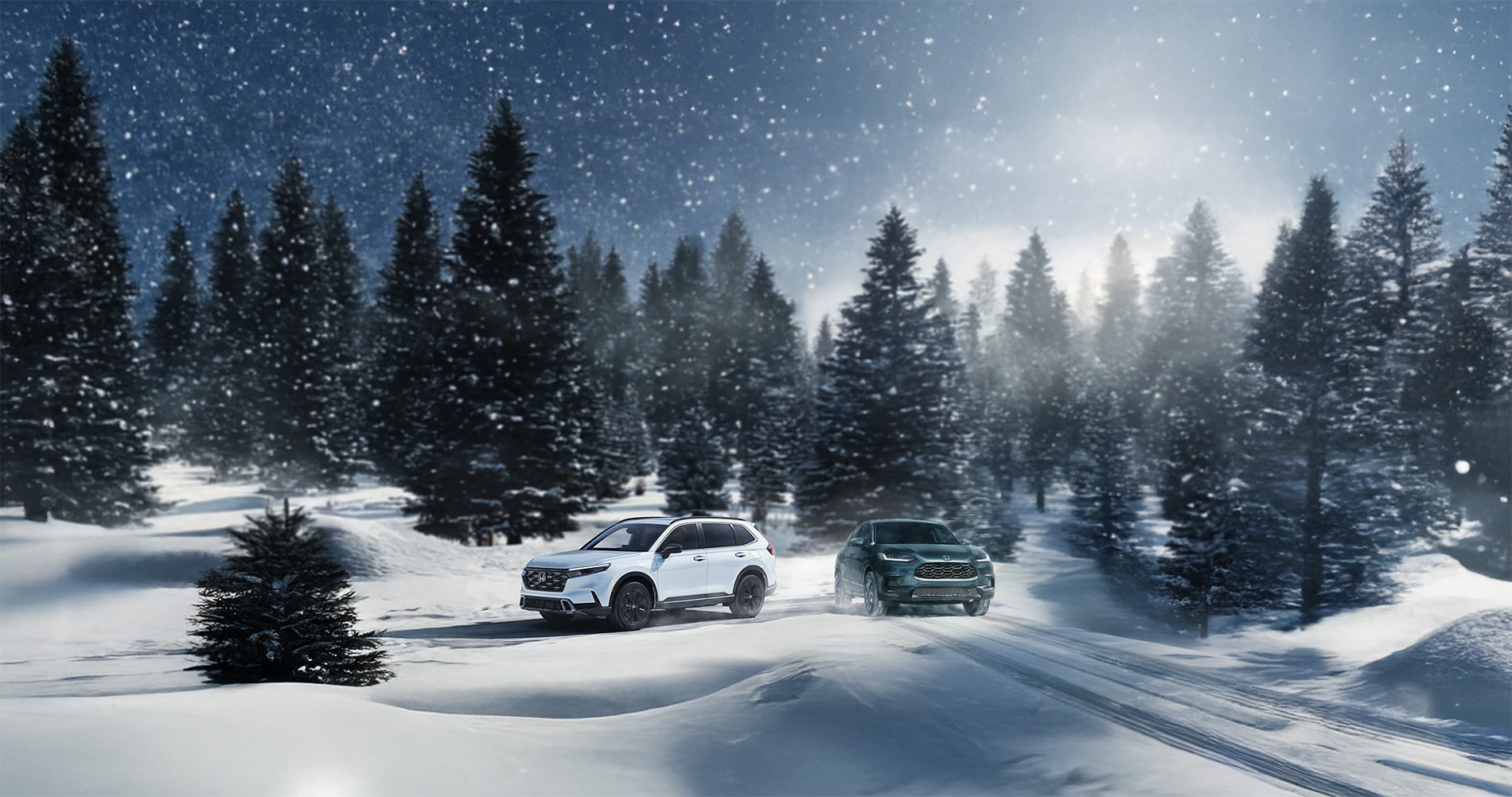 2026 Honda CR-V vs HR-V driving through a snowy forest