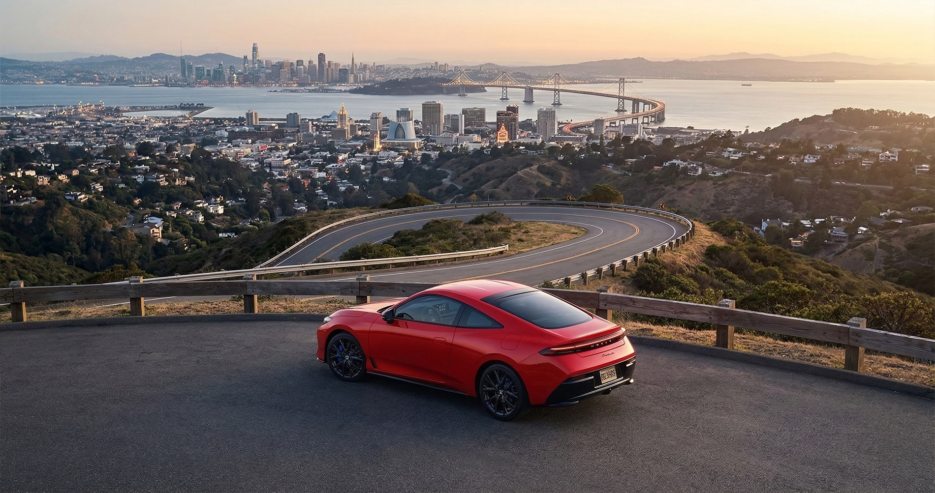 2026 Honda Prelude sport coupe overlooking San Francisco skyline and Bay Bridge from Oakland Hills