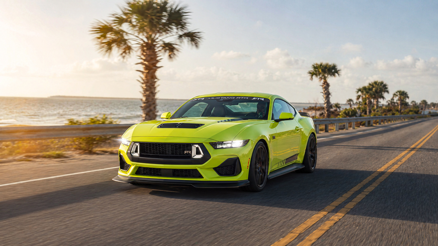 RTR Mustang Spec 3 driving on a paved road along the coast of Georgia with sun flare