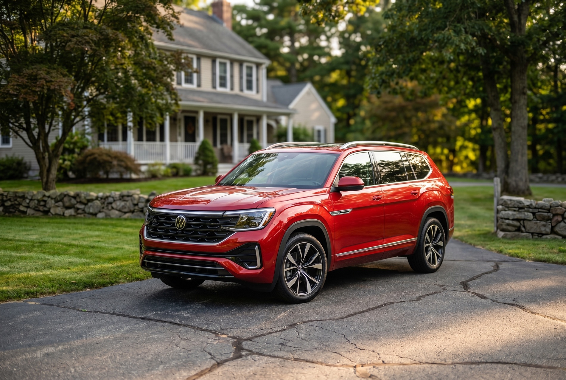 Red 2026 Volkswagen Atlas SEL Premium R-Line parked in a residential driveway