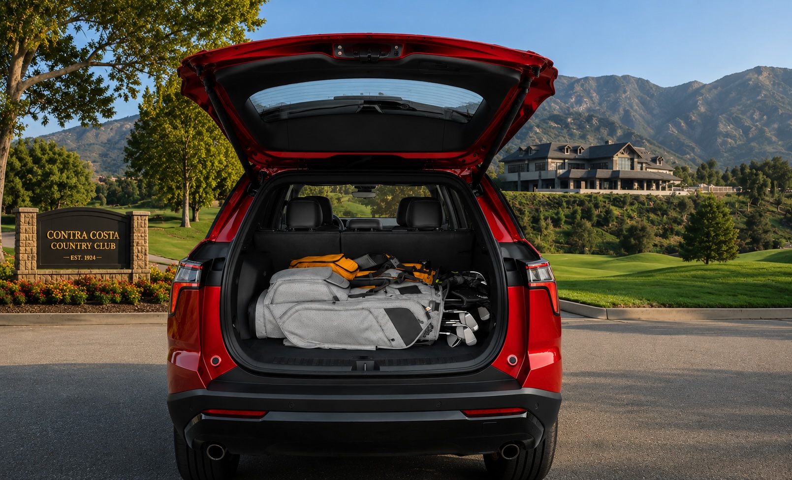 2026 Chevy Equinox showing the cargo space loaded with gold bags outside the Contra Costa Country Country Club
