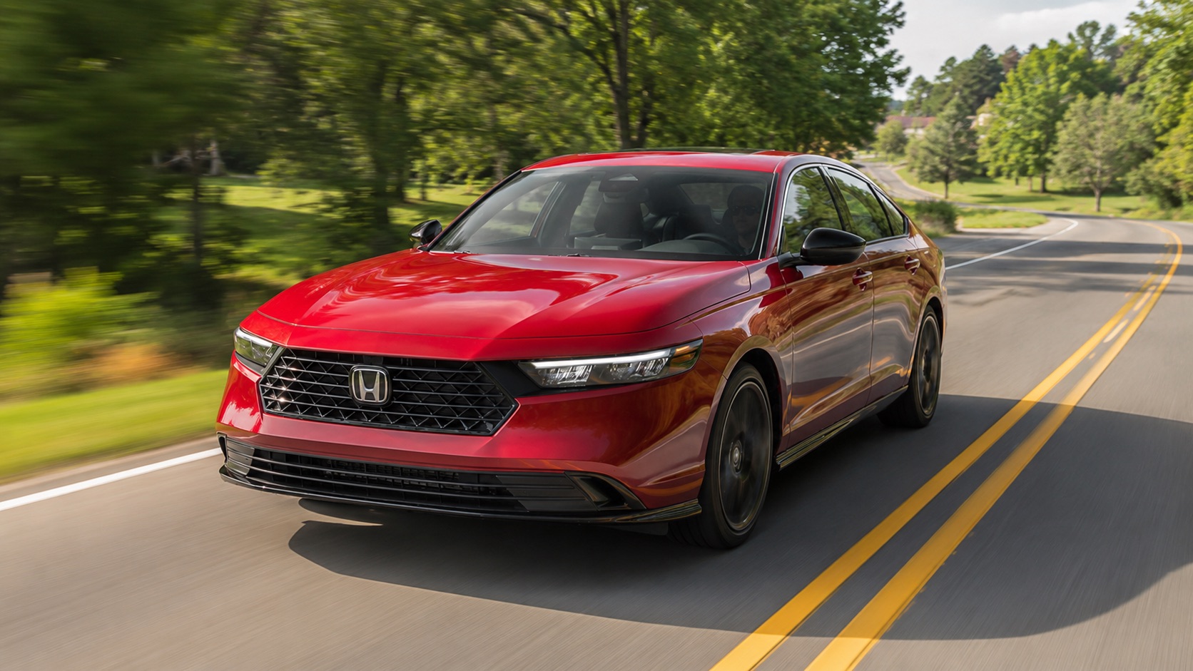 2026 Honda Accord driving on a wooded road near Troy, NY