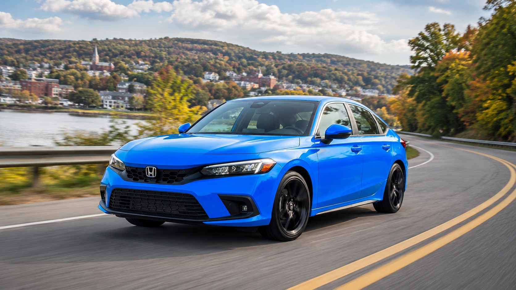 2026 Honda Civic driving on a local road near Troy, NY