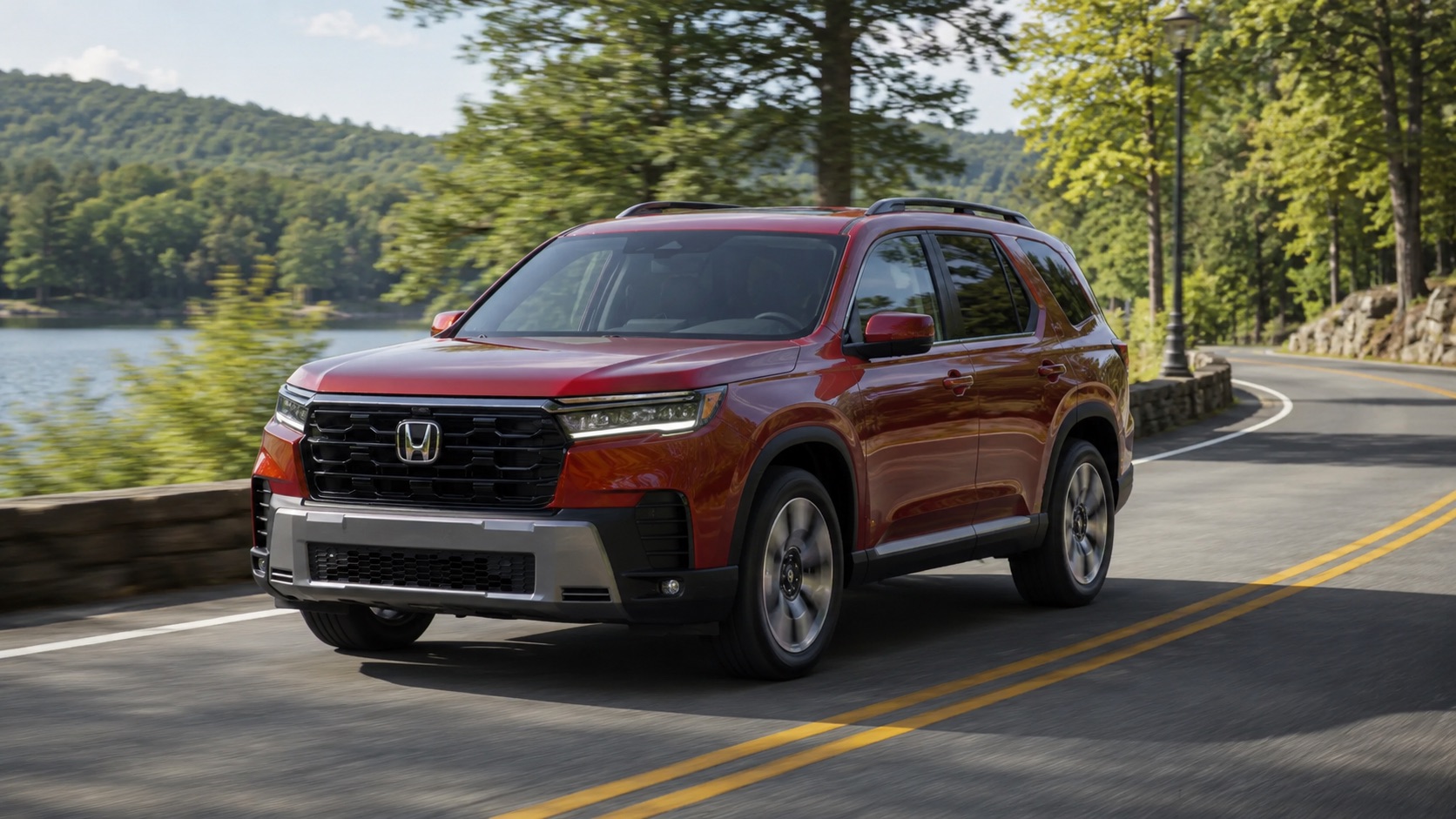 2026 Honda Pilot driving on a wooded road near Troy, NY