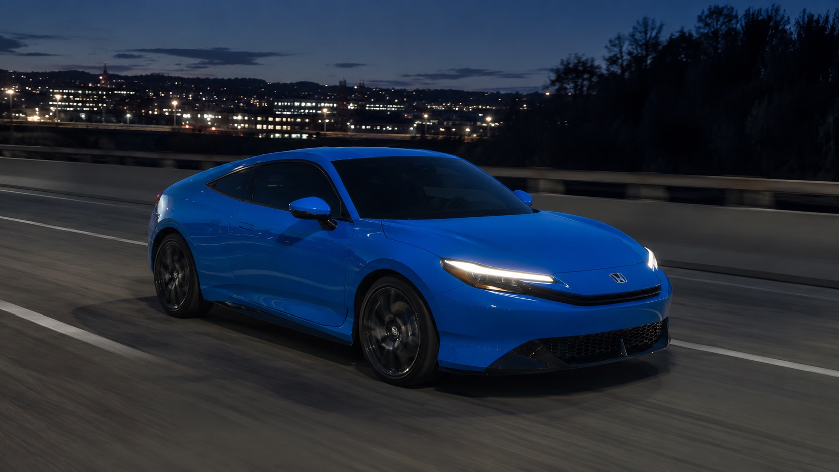 2026 Honda Prelude cruising on a highway at night near Troy, NY