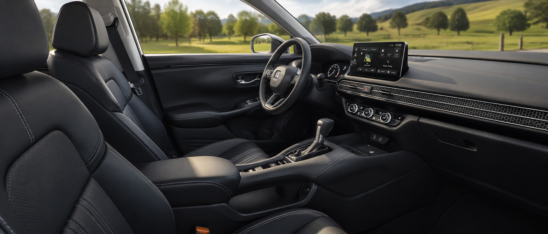 2027 Honda HR-V interior view with a rural scene through the windows.