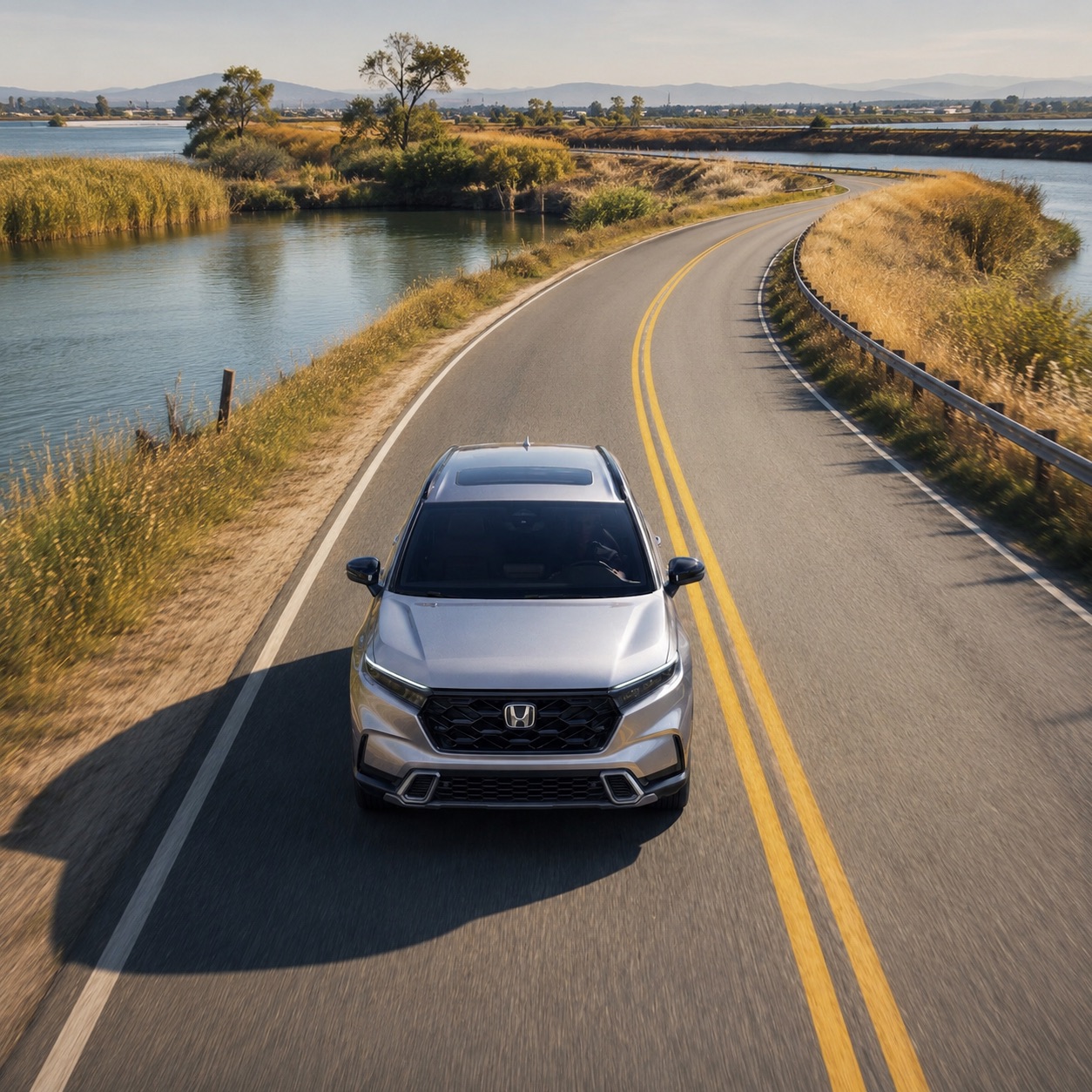 Honda CR-V driving along a Delta-area road near Pittsburg, CA