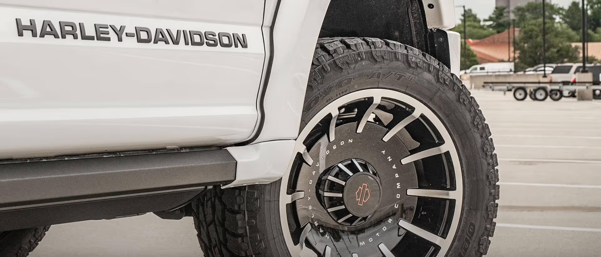 Harley-Davidson F-150 22-inch Fatboy wheel and 35-inch all-terrain tire detail