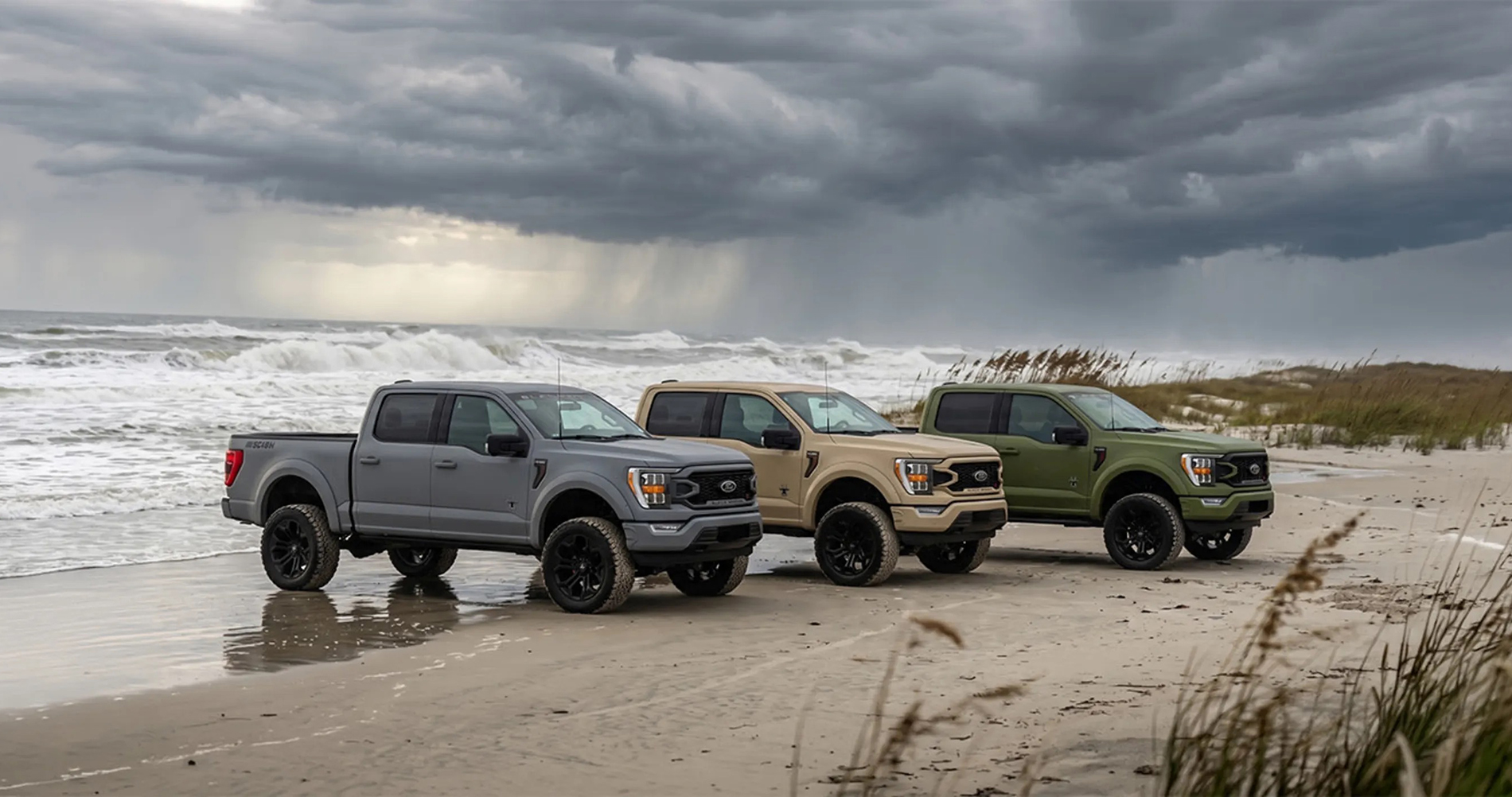 Black Widow Military Edition trucks parked on a Lowcountry beach near Hilton Head