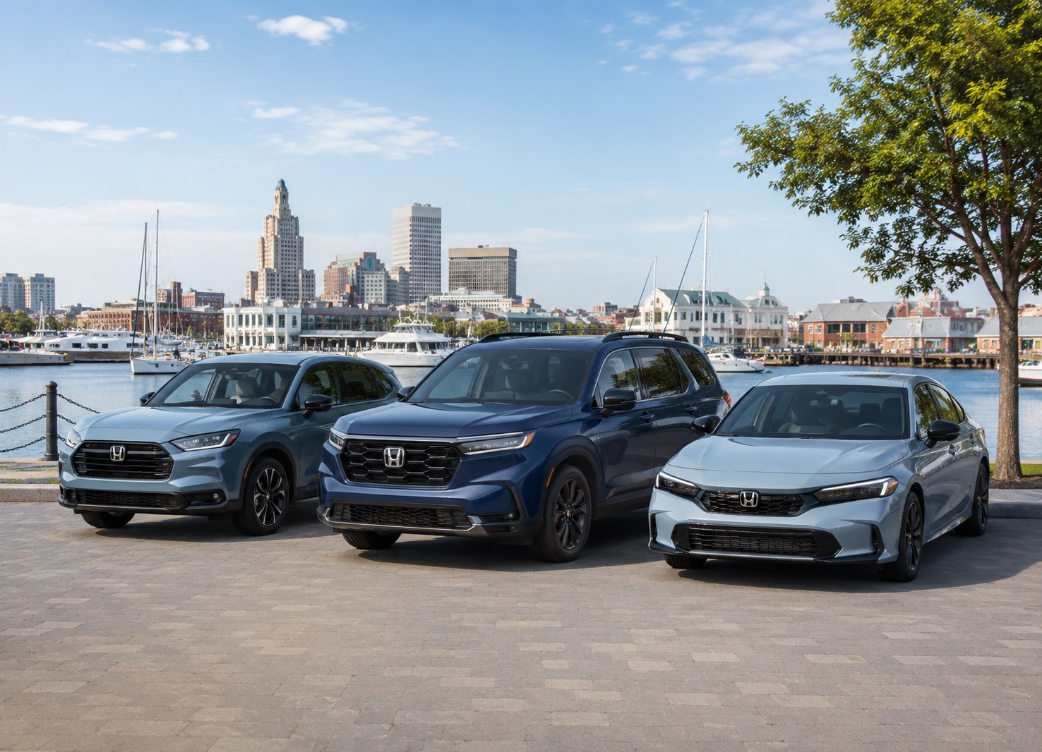 Honda Civic, CR-V, and HR-V parked near the Providence waterfront for Rhode Island shoppers comparing models at Silko Honda