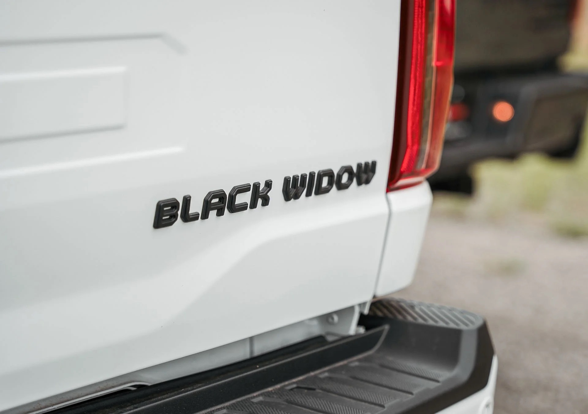Custom Black Widow Military Edition badging on a specialty Ford truck