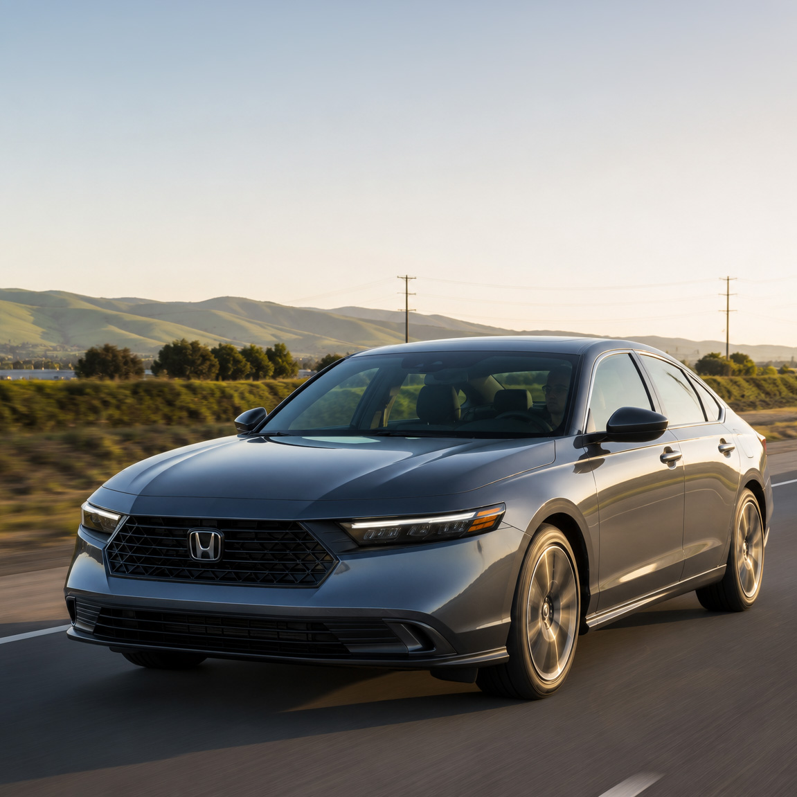 2026 Honda Accord commuting near Tracy, California, with rolling hills and local roadway scenery in the background.