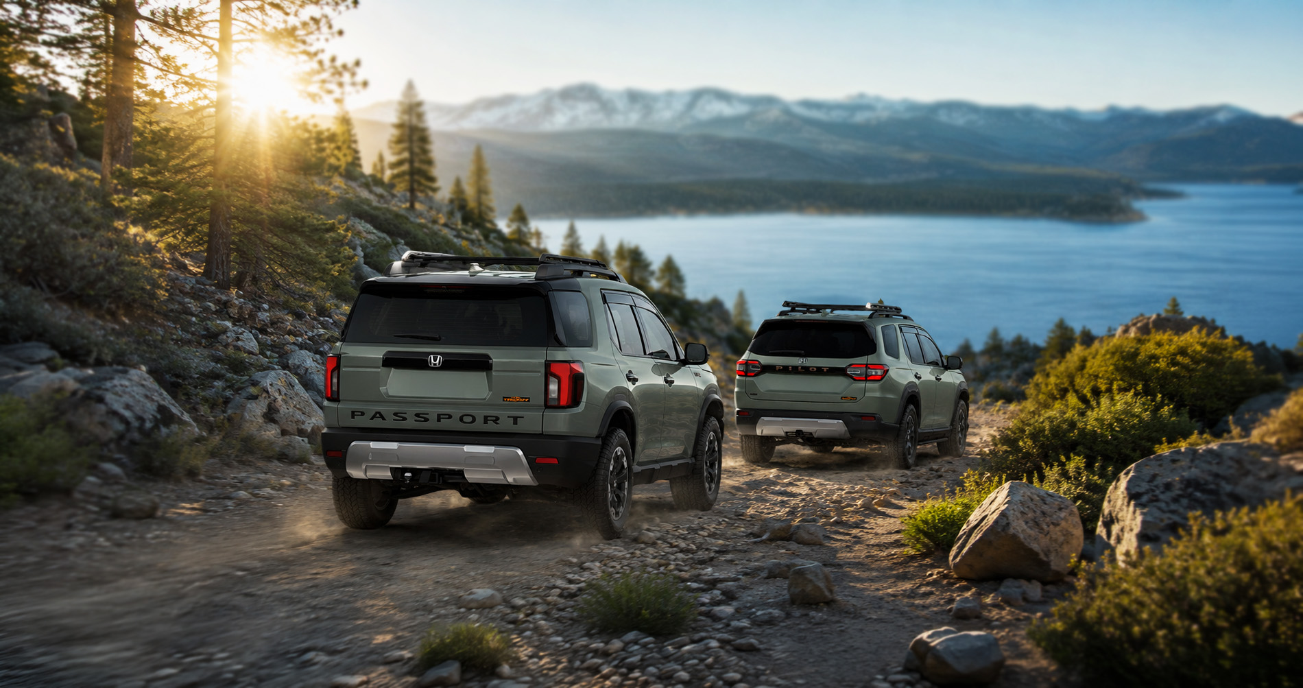 Green Honda Passport and Honda Pilot SUVs driving on rocky mountain trail overlooking lake and snow capped peaks at sunrise highlighting off road capability.