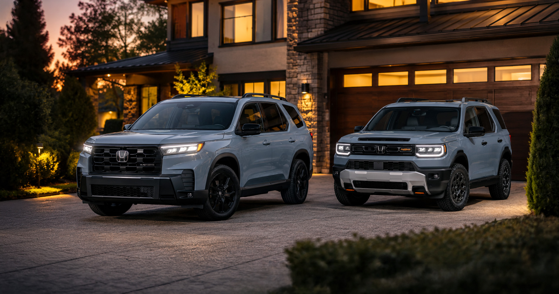 Light gray Honda Passport and Honda Pilot parked in driveway at dusk in front of modern home emphasizing styling and trim contrast.