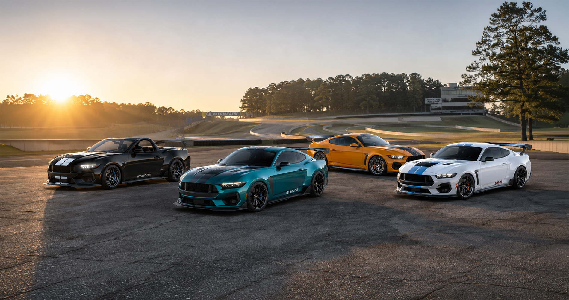 Four Shelby Mustang models in black teal orange and white parked on a racetrack at sunrise showcasing the full performance-model range.