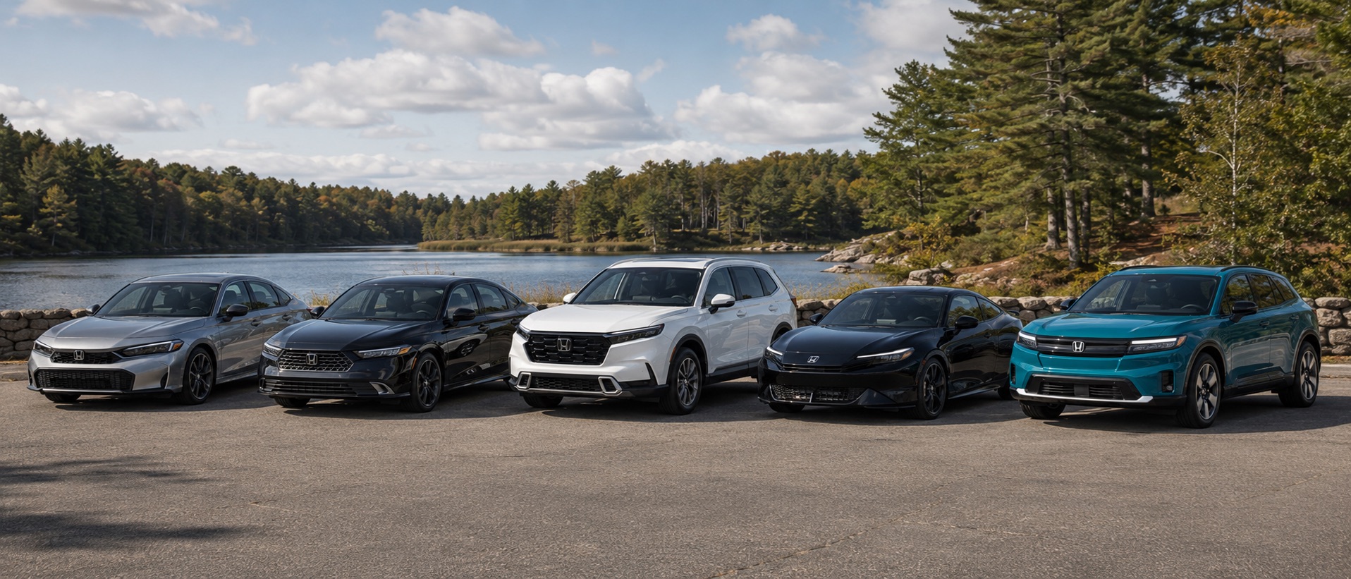 2026 Honda hybrid and electric lineup parked beside a scenic New England lake, featuring the Civic Hybrid, Accord Hybrid, CR-V Hybrid, Prelude Hybrid, and Prologue.
