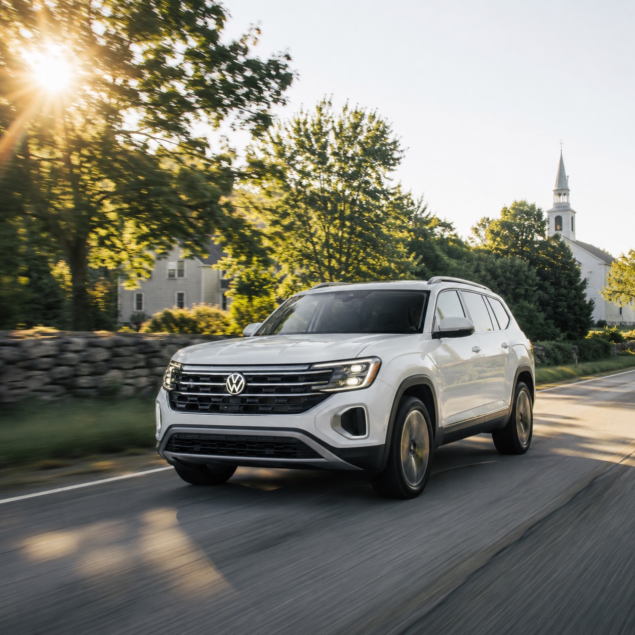 White 2026 Volkswagen Atlas driving through Easton, Massachusetts