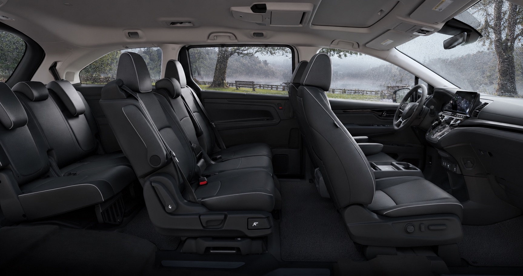 2027 Honda Odyssey Elite three-row interior on a rainy day in El Cerrito, CA