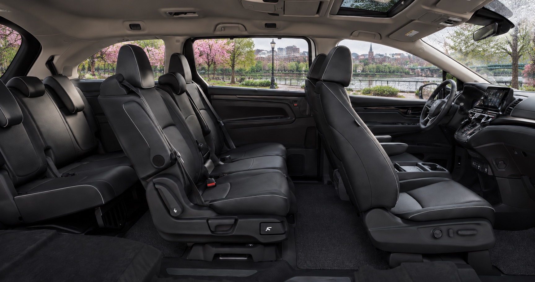 2027 Honda Odyssey Elite three-row interior with black seating in Troy, NY