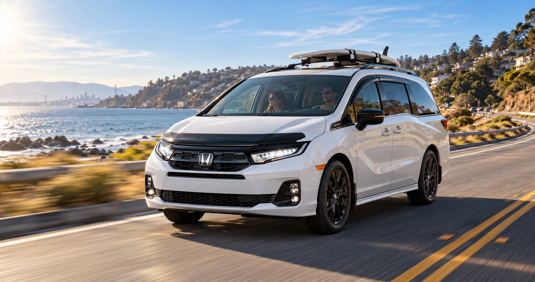 2027 Honda Odyssey Sport-L with surfboards on the roof driving near El Cerrito, CA