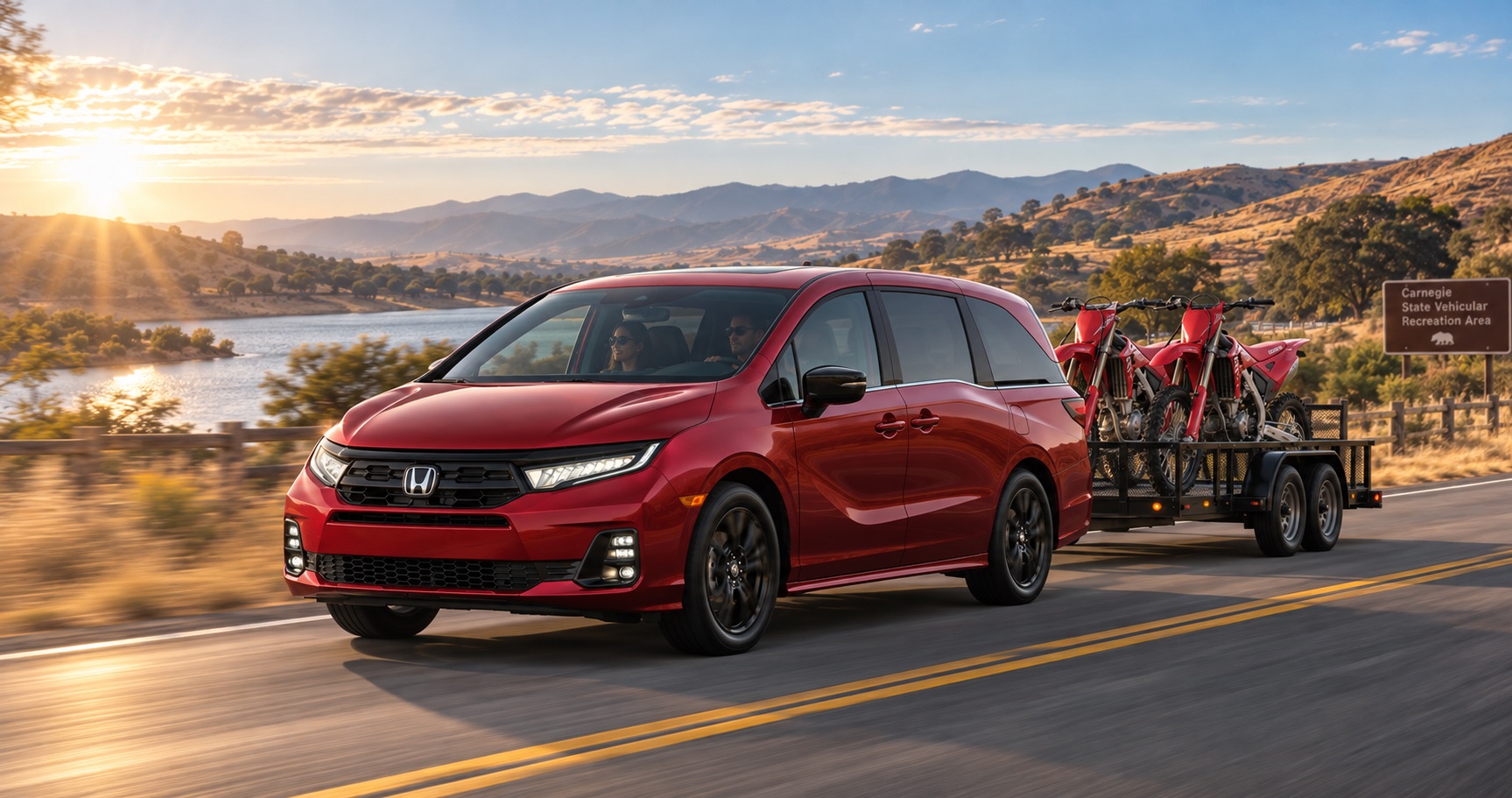 2027 Honda Odyssey Sport-L towing two dirt bikes near Tracy, CA
