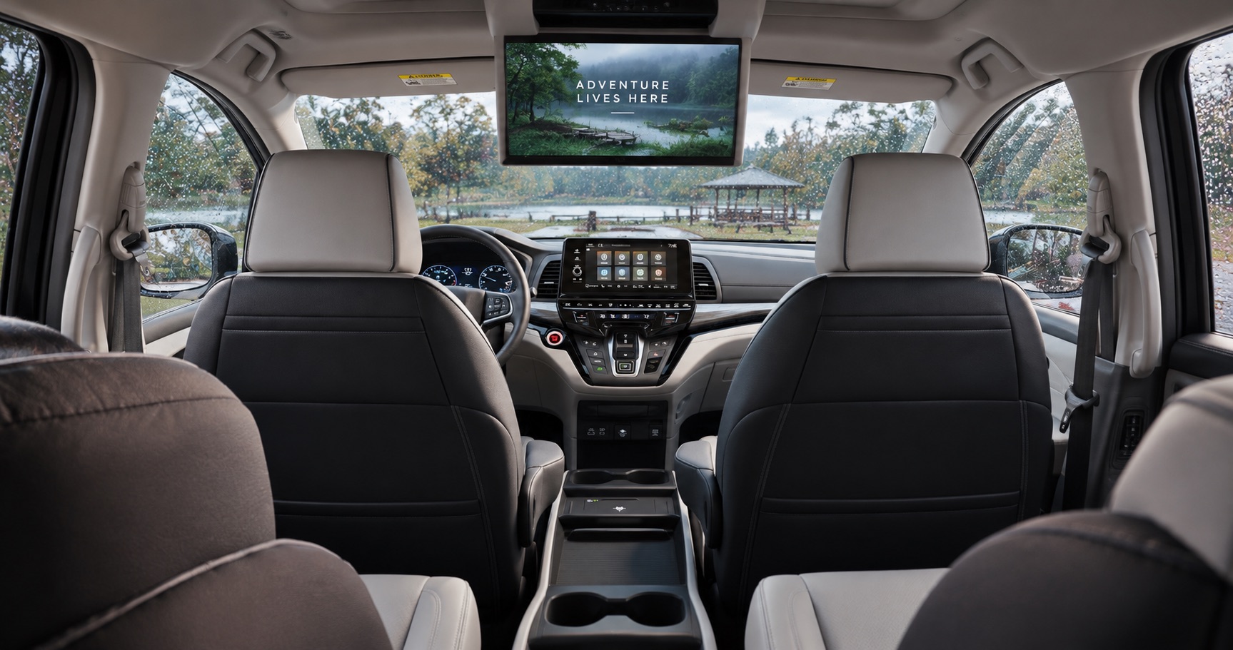 2027 Honda Odyssey interior with rear entertainment system on a rainy day in Elizabethtown, KY