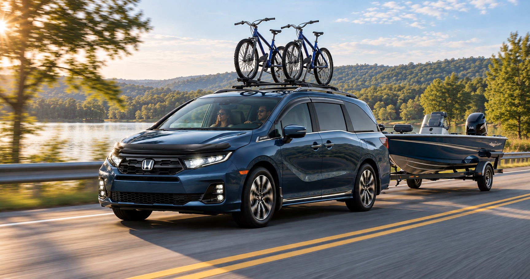 2027 Honda Odyssey towing a boat with two bikes on the roof near Elizabethtown, KY