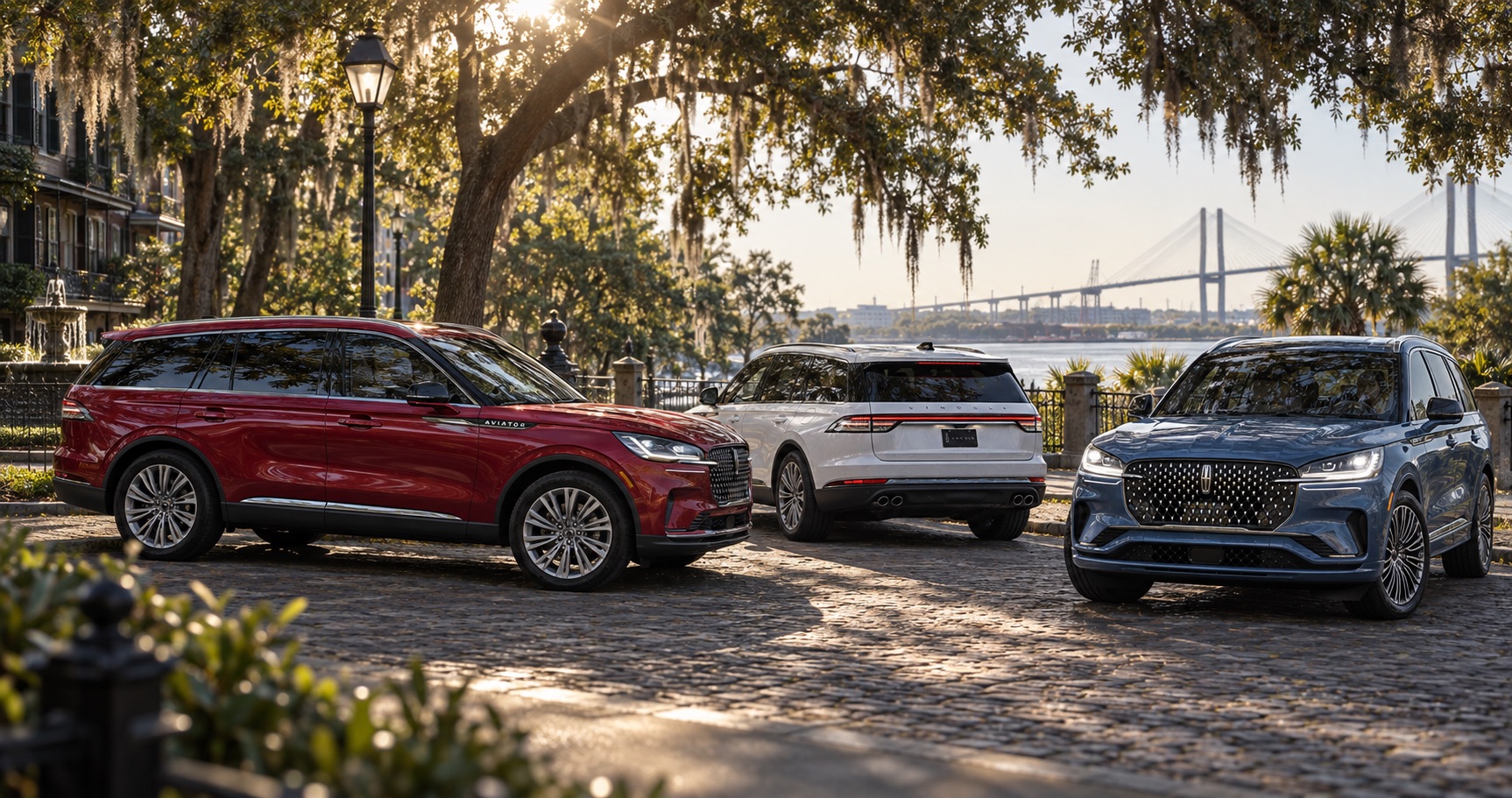 2027 Lincoln Aviator trim levels parked near the Savannah River with the bridge in the background