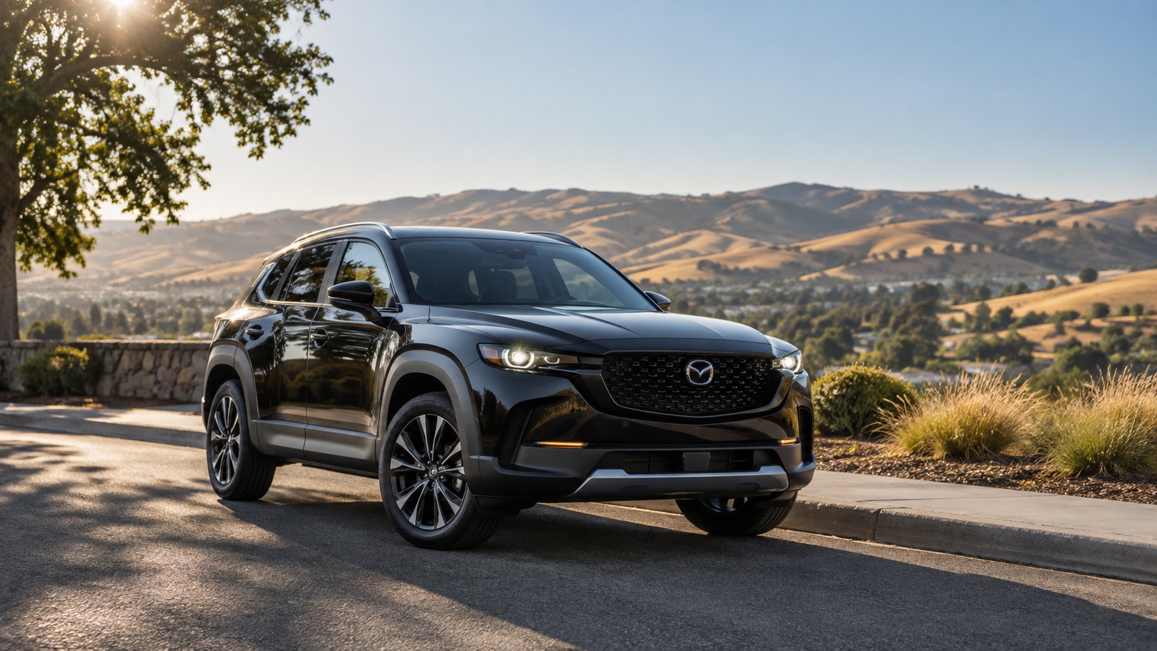 Black 2026 Mazda CX-50 parked along a quiet street overlooking the rolling golden hills of Dublin, California, on a clear summer morning