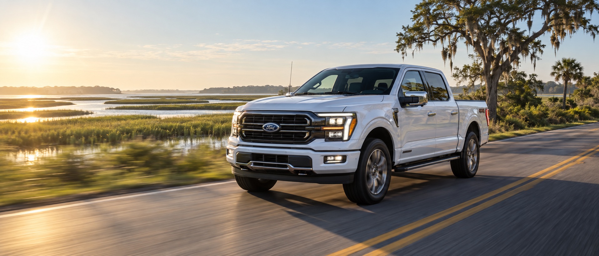 White 2026 Ford F-150 driving through coastal marshland near Brunswick, Georgia