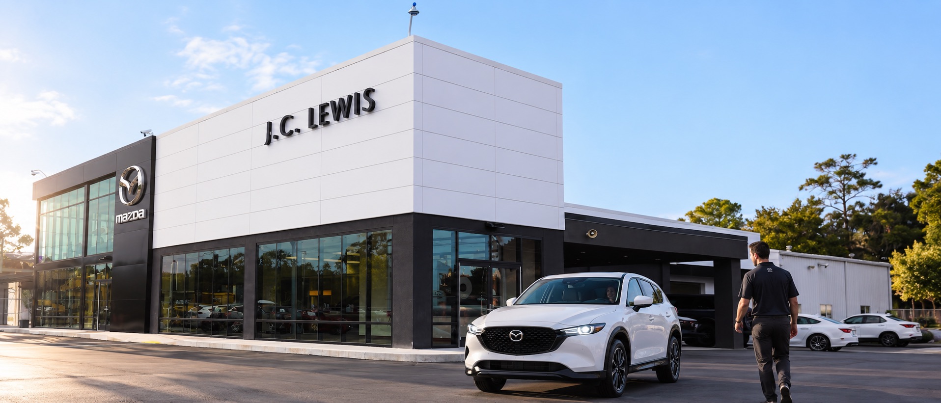 White Mazda CX-5 arriving for service at J.C. Lewis Mazda in Savannah, GA