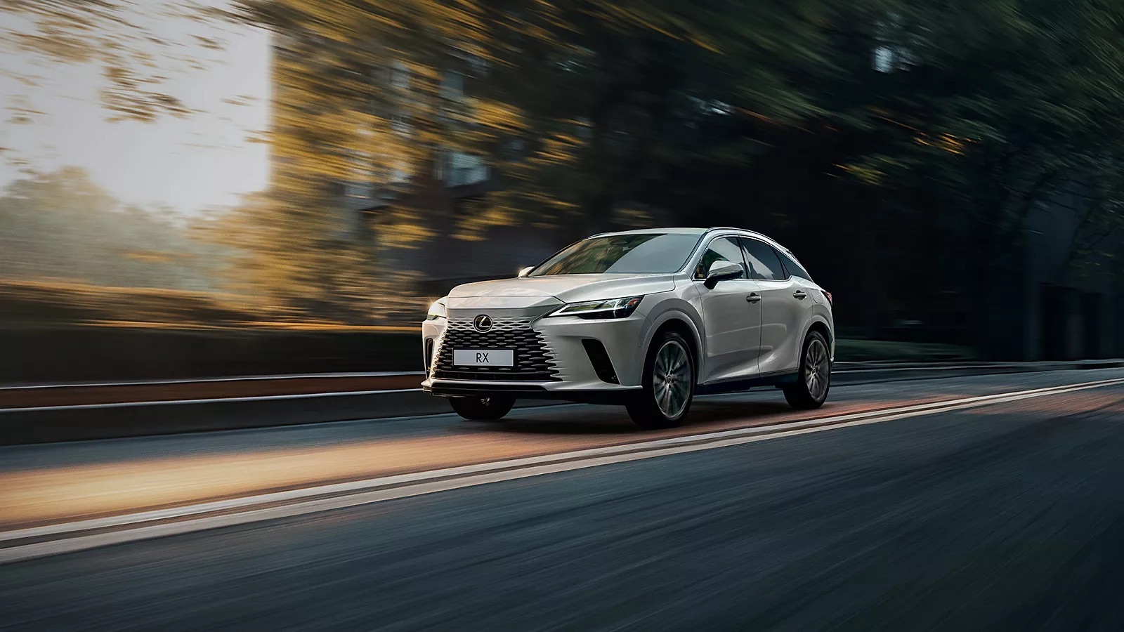 2026 Lexus RX midsize luxury SUV exterior, showing its contemporary Lexus design and front-end styling.