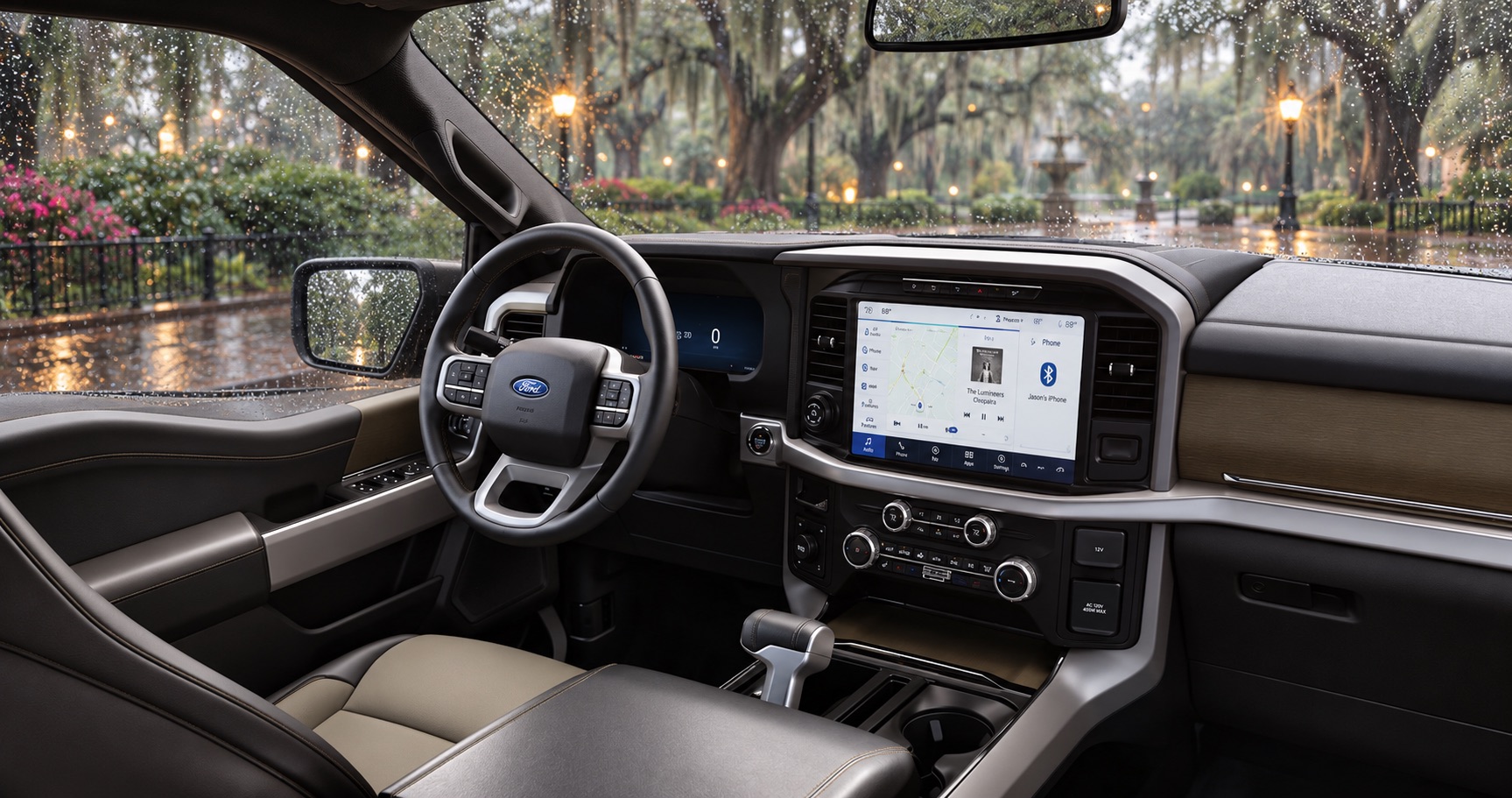 2027 Ford F-150 interior with touchscreen and digital gauges overlooking a rainy Savannah, GA park