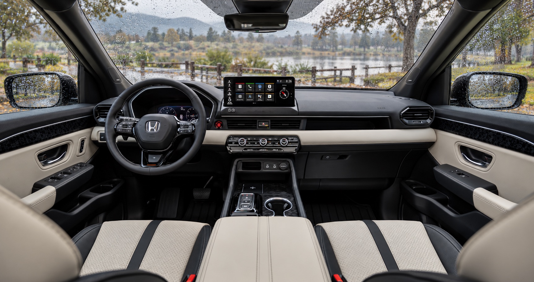 2027 Honda Passport interior overlooking a rainy park in Tracy, CA