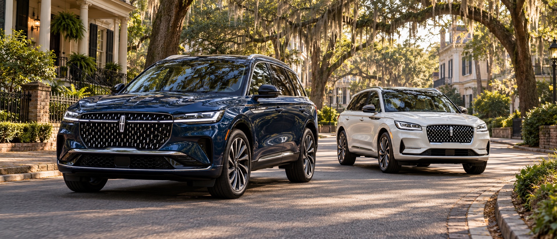 026 Lincoln Nautilus Hybrid and 2026 Lincoln Corsair Grand Touring on a picturesque Savannah, Georgia, residential street beneath moss-draped live oak trees.