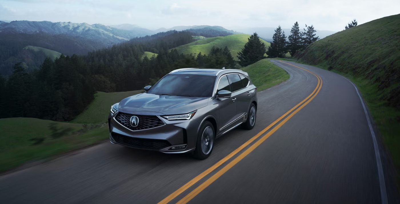 Acura MDX three-row luxury SUV exterior; details vary between the 2019–2020 and 2022–2024 generations.