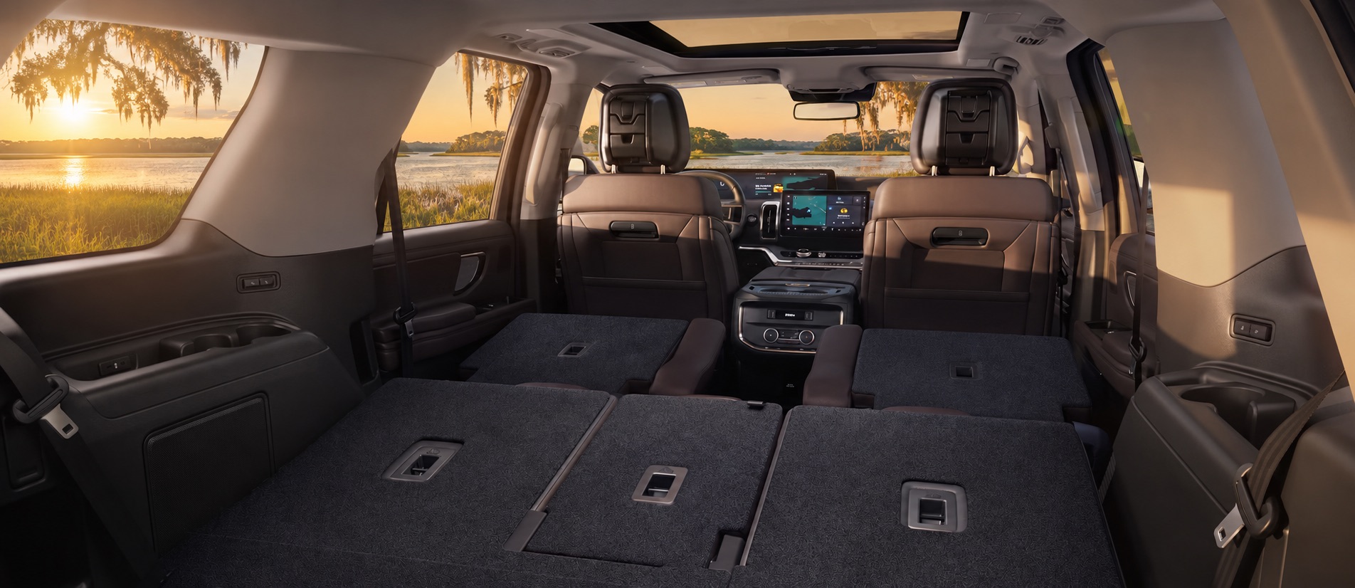 View from inside an SUV looking out over a Savannah-area coastal marsh at sunset