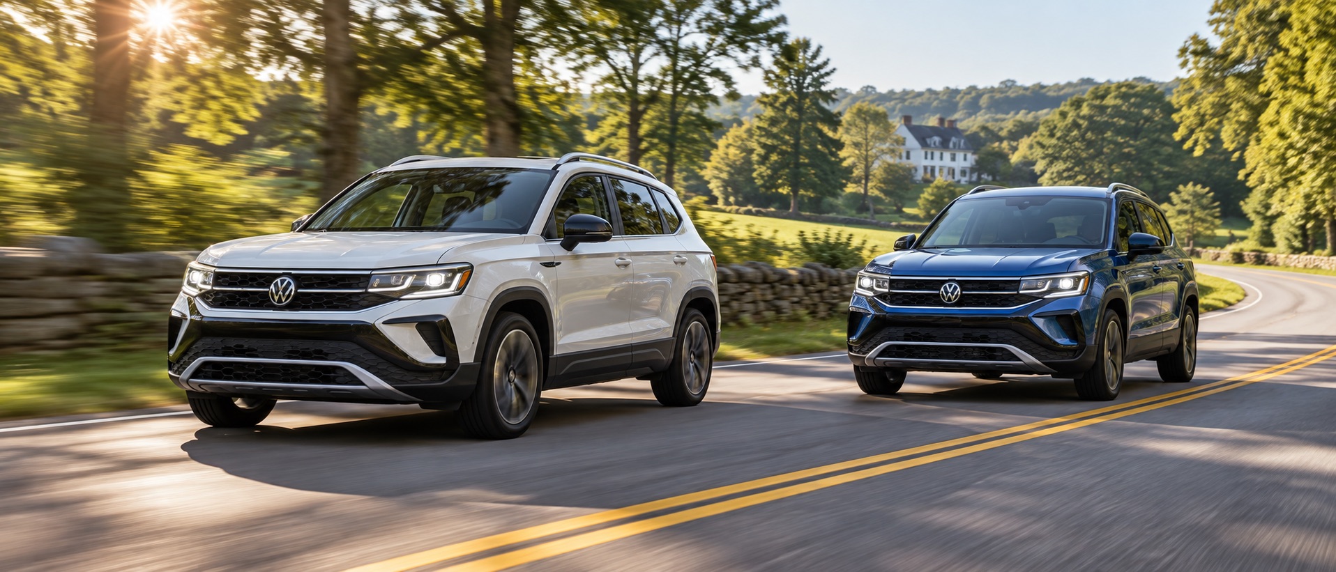 Two 2027 Volkswagen Taos SUVs, one light-colored and one blue, driving on a scenic road in southeastern Massachusetts.